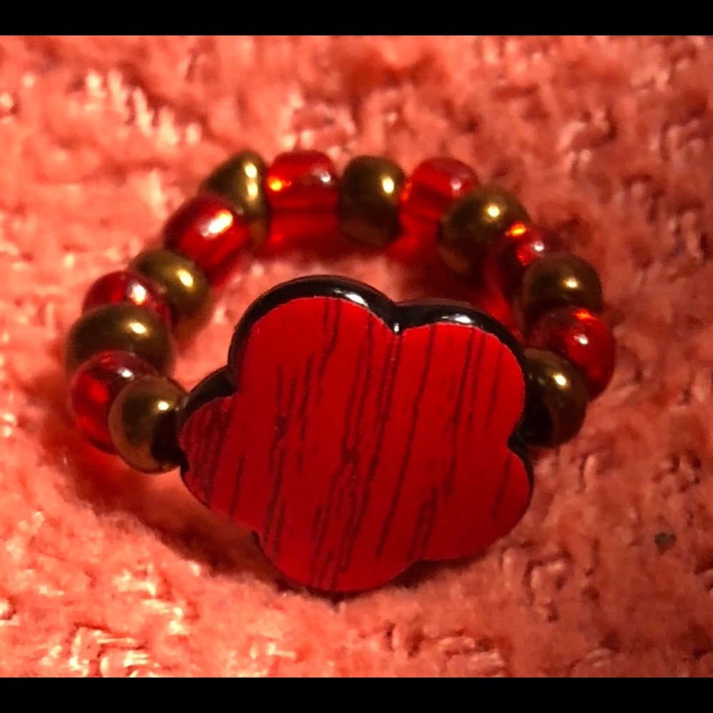 Homemade ring with a accented flower.